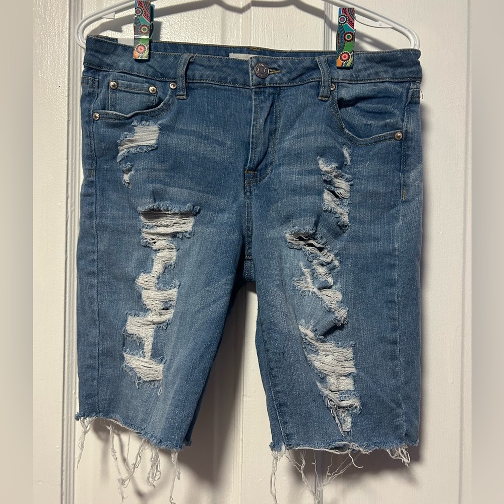 Mid-length ripped jean shorts